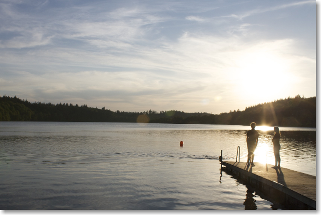 Standing on the Dock of the Lake